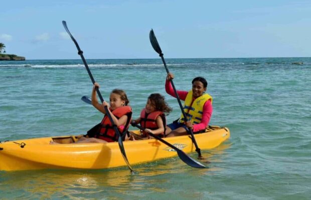 Family kayaking at our luxury Caribbean resort