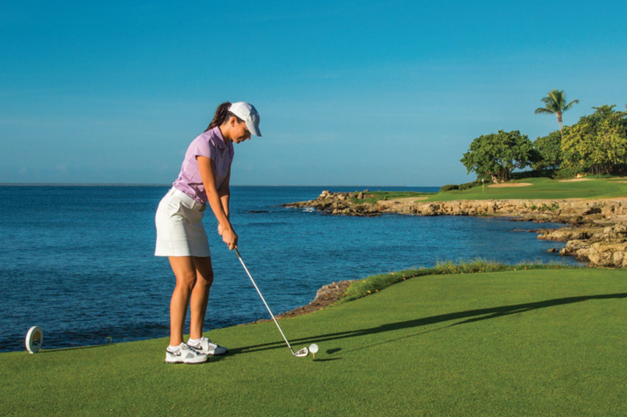 Guest teeing off at Casa de Campo Resort & Villas