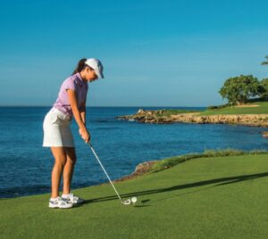 Guest teeing off at Casa de Campo Resort & Villas